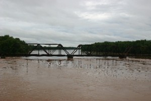 Old RailRoad Bridge at Lewisburg. 9/2011 flood. by Janet Rider
